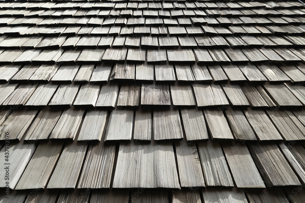 Weather resistant wood shingle siding background Weather resistant wood shingle siding background