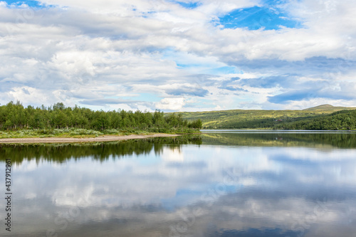 Fototapeta Naklejka Na Ścianę i Meble -  Lake with water reflections in the north