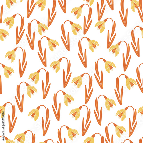 Decorative seamless isolated pattern with orange random snowdrops flowers ornament. White background.