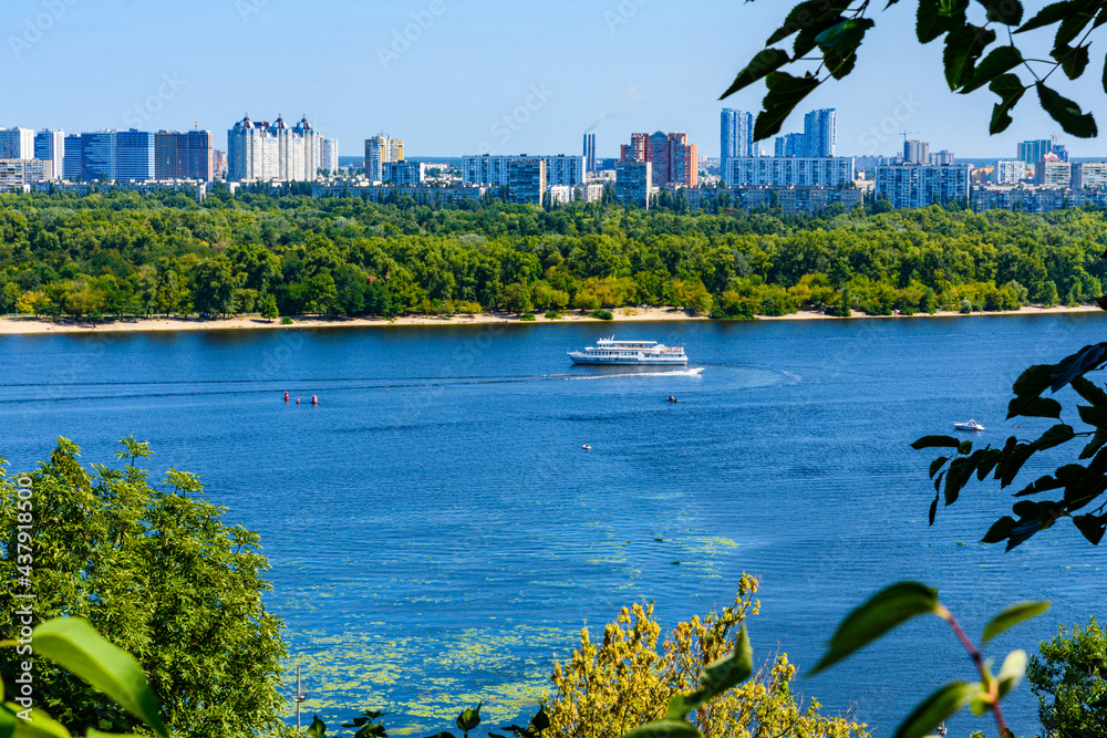 Naklejka premium View on a river Dnieper and residential districts in Kiev, Ukraine
