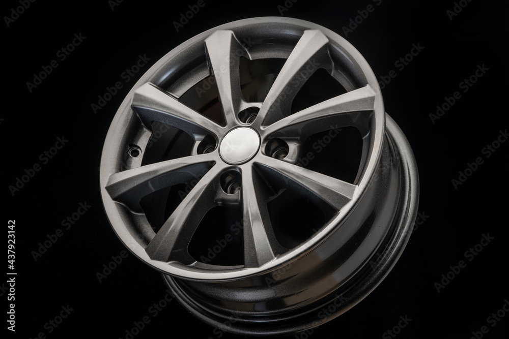 the new alloy wheel is grey on a black background. auto parts and tuning, side view