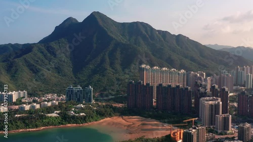 Aerial view of mountain with a sunny day of Hong Kong China in Ma On Shan and Wu Kai Sha Beach Starfish Bay. Parallax drone shot. photo