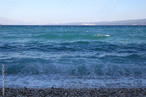 Waves on a beach in Croatia. Selective focus. © jelena990