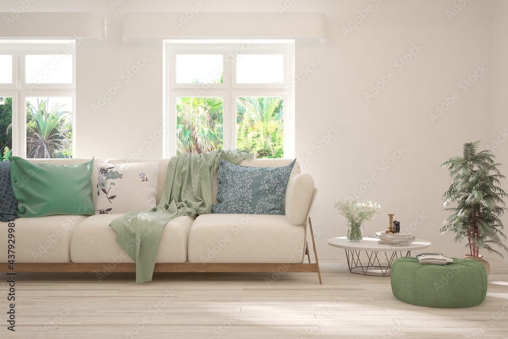 Fototapeta premium White living room with sofa and summer landscape in window. Scandinavian interior design. 3D illustration