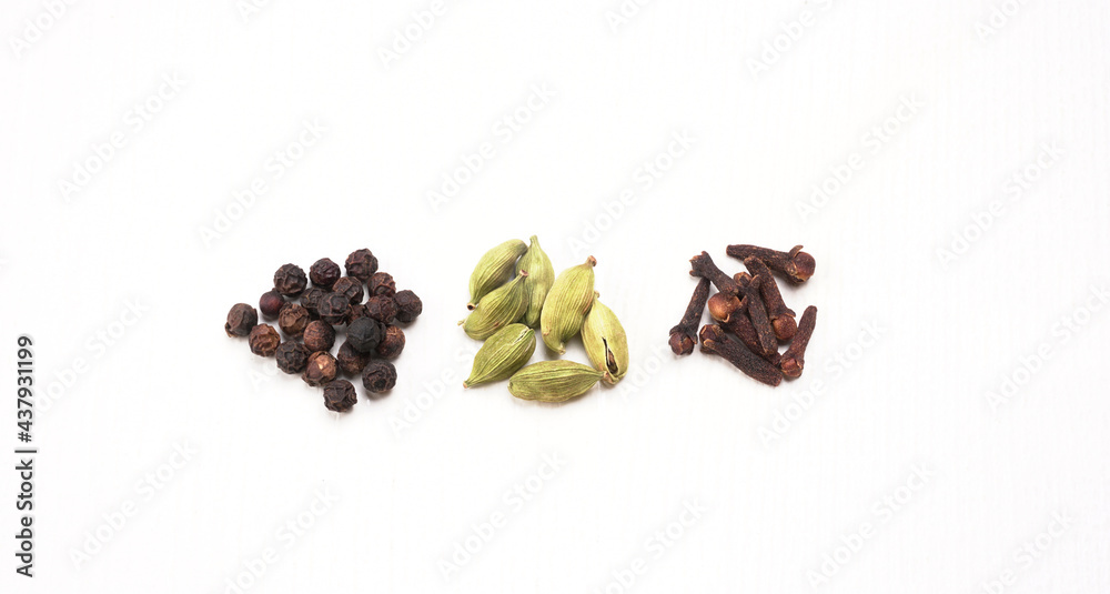 Obraz premium Group of Organic Black pepper isolated on white background. Selective focus and Top view (Flat Lay)
