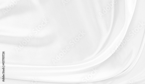 White gray satin texture that is white silver fabric silk background with beautiful soft blur pattern natural.