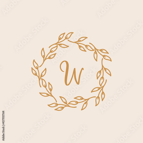 Hand-drawn wreath logo. Botanical label for packaging. Herbal wreath emblem wedding design.