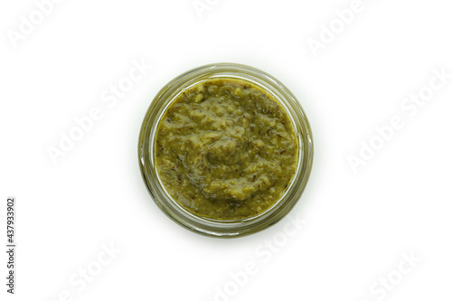 Jar of Pesto sauce isolated on white background