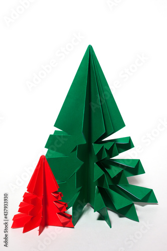 Green and red origami trees. Christmas decoration trees.