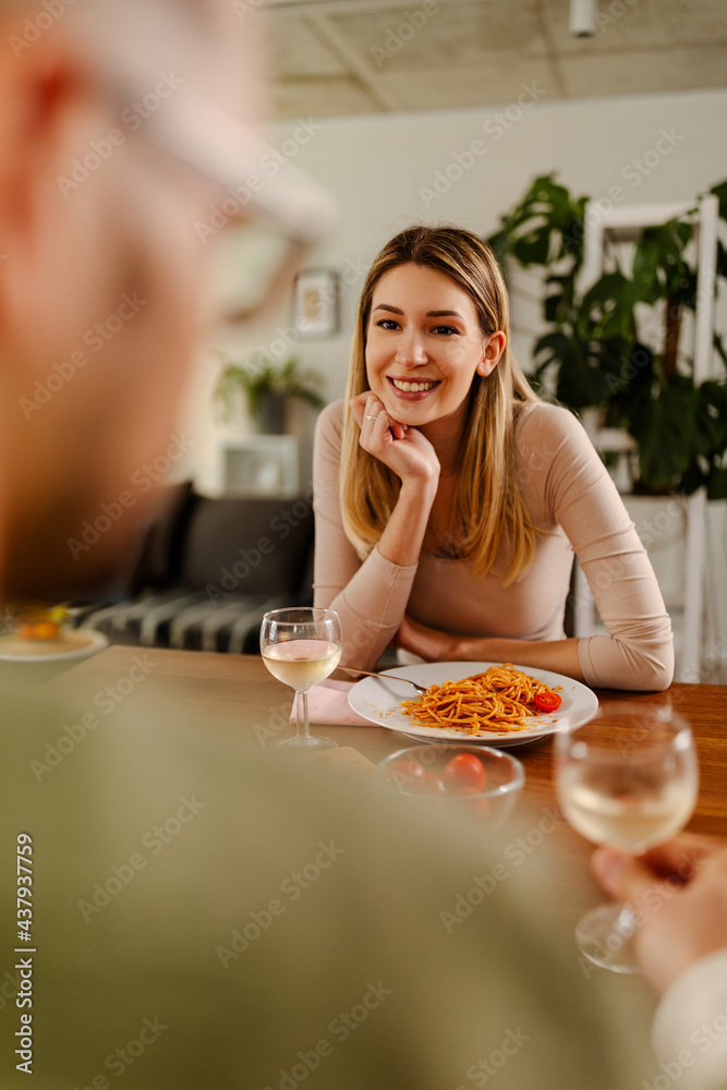 Close up photo of cheerful girl having romantic time, eating food and drinking a wine. Close up photo of cheerful girl having romantic time, eating food and drinking a wine.
