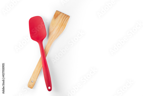 Fotografi wooden kitchen shovel, miserable red spatula