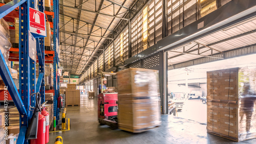 Fényképezés Receiving and shipping operation at logistics warehouse.