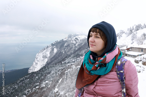Woman posing on observation deck of Ai-Petri mountain peak