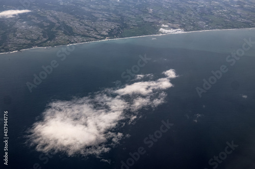 Fototapeta Naklejka Na Ścianę i Meble -  above the clouds over the coast of Bali