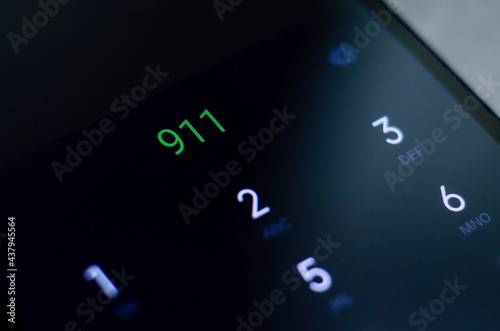 Emergency number 911 displayed on a  cell phone.