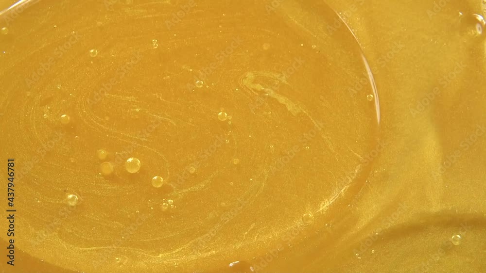 golden water on black background golden water on black background