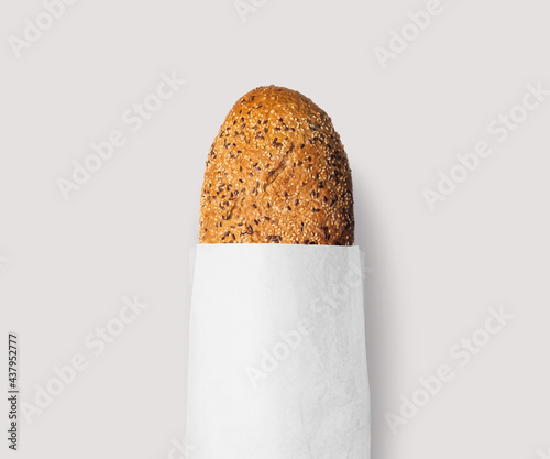 Fresh bread baked with seeds in a kraft paper bag, natural, white or black!