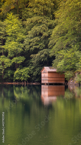 house on a lake in Bavaria. Beautiful warm sunlight