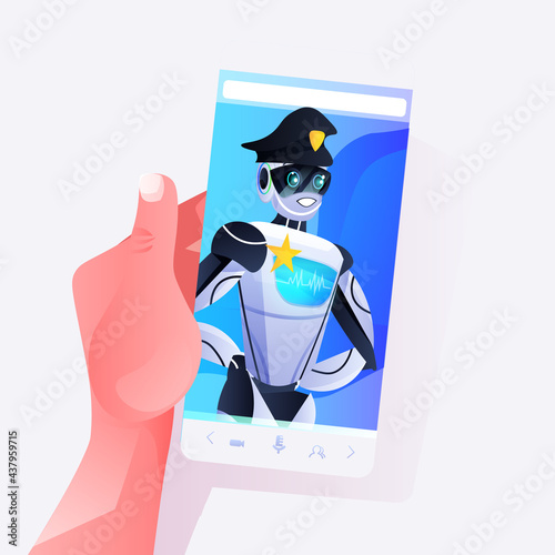 human hand using smartphone with police robot on screen patrol cop in uniform artificial intelligence technology