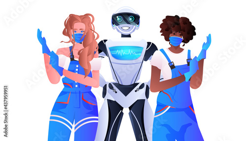 robotic janitor with women cleaners standing together cleaning service artificial intelligence technology concept