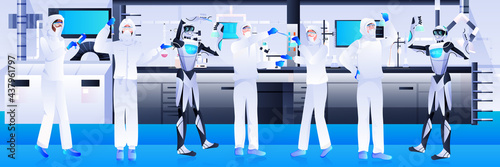 robots with scientists in protective suit making experiments in lab genetic engineering artificial intelligence concept