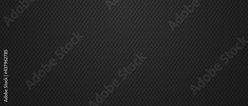 Sharp metal scales pattern on black background.