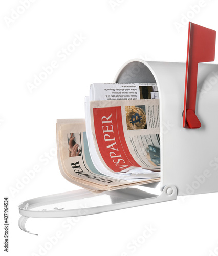 Mail box with newspapers on...