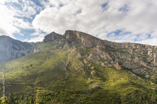Steep mountains in the interior of Alicante (Spain), on a morning with cloudy skies.