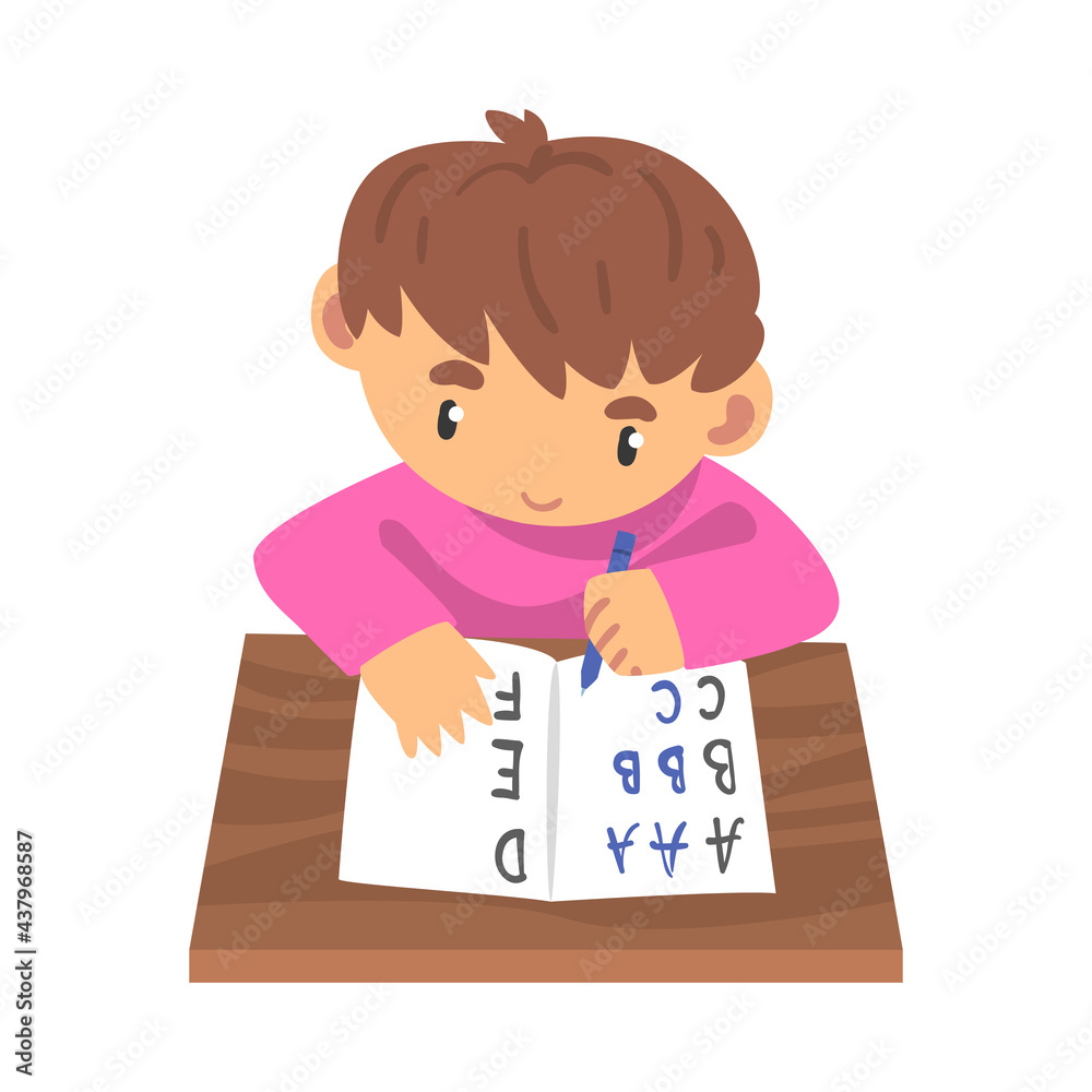 Cute Little Boy Learning to Write, Elementary School Student Sitting at his Desk and Writing Cartoon Vector Illustration Cute Little Boy Learning to Write, Elementary School Student Sitting at his Desk and Writing Cartoon Vector Illustration