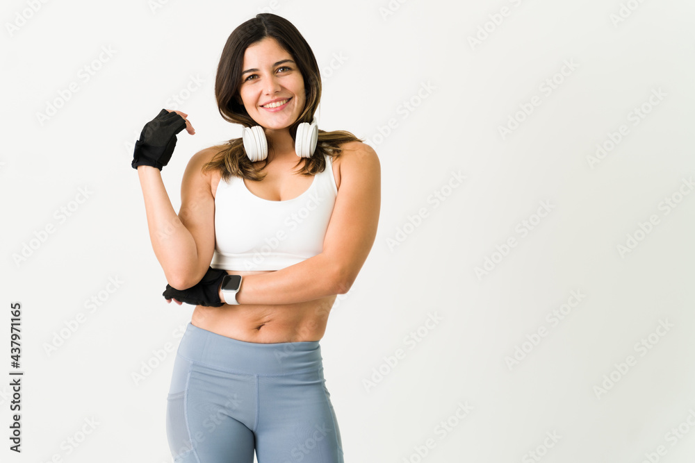 Cheerful woman preparing for a workout Cheerful woman preparing for a workout