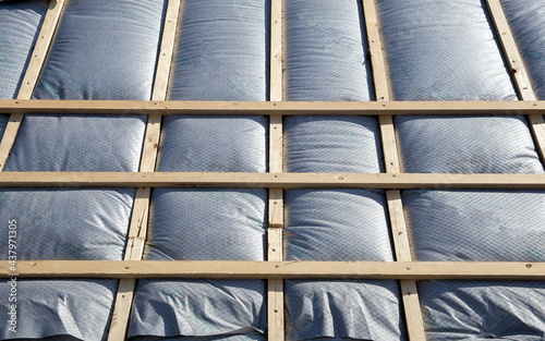 Fotografi New roof coverings with insulation, isolation tiled roof, house renovation close
