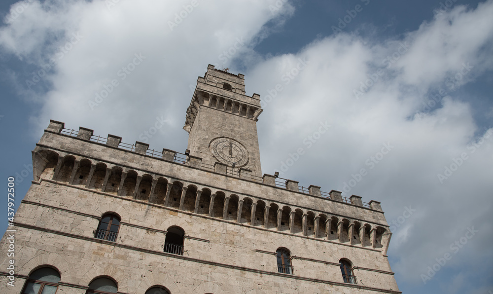 Pulcinella clock tower building at piazza Grande in montepulciano , Tuscany italy
