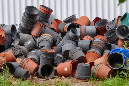 Fényképezés Variety of many plastic flowerpots
