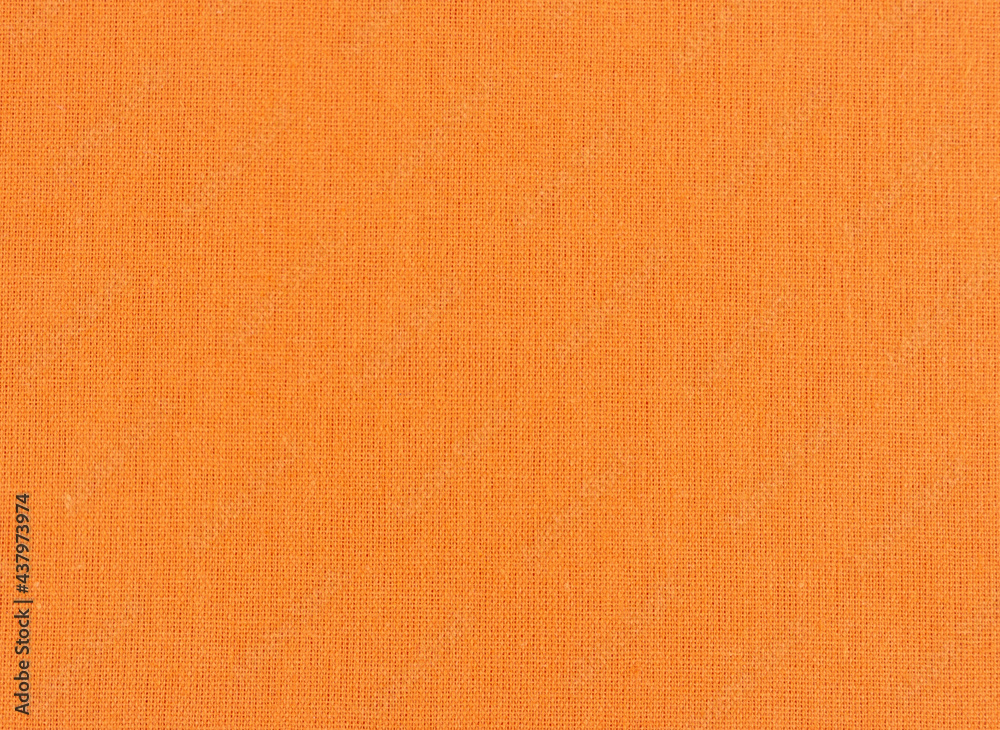 Closeup of orange textile. Fabric details backdrop Closeup of orange textile. Fabric details backdrop