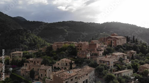 Ascending over Deia in the Tramuntana Mountains of Mallorca at Dusk photo