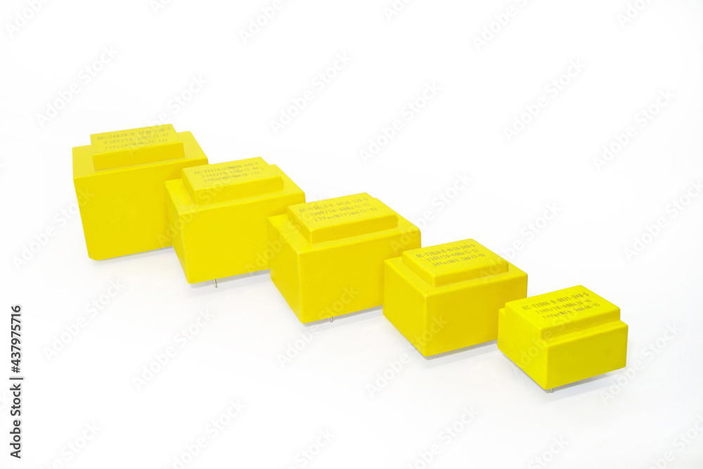 Group of solid state relays (SSR) arranged in line by size. White background Group of solid state relays (SSR) arranged in line by size. White background
