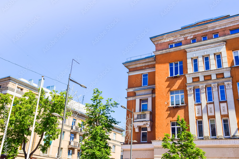 Fototapeta premium Old unique stylish buildings from soviet times in Siauliai boulevard street in Lithuania.