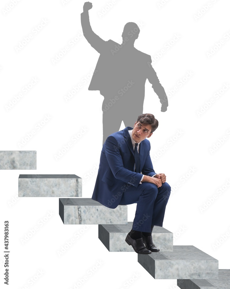 Businessman and his shadow in business concept Businessman and his shadow in business concept
