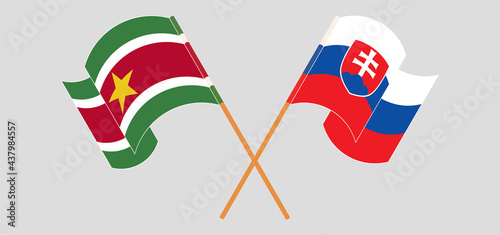 Canvas Print Crossed and waving flags of Suriname and Slovakia