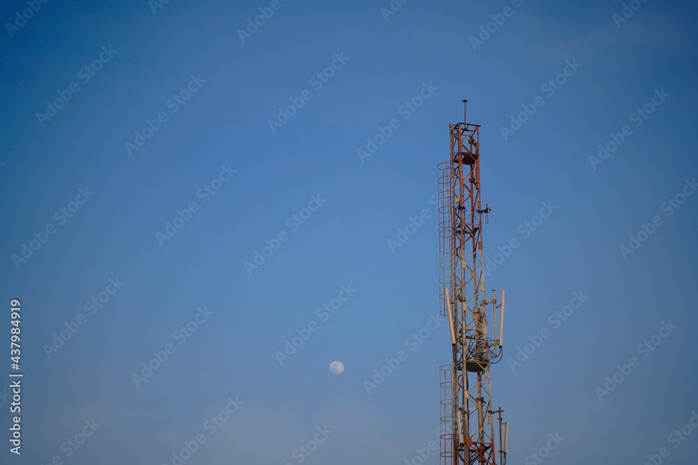 Telecommunication cell tower isolated over blue sky
