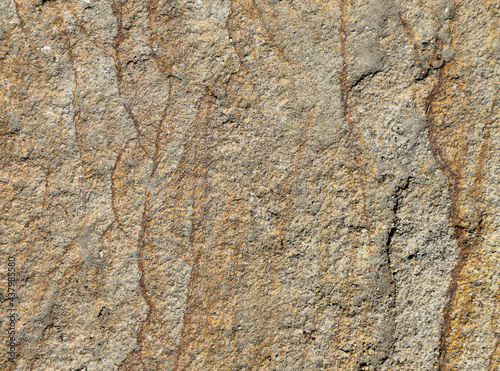 Texture of a colorful natural stone with layer structure