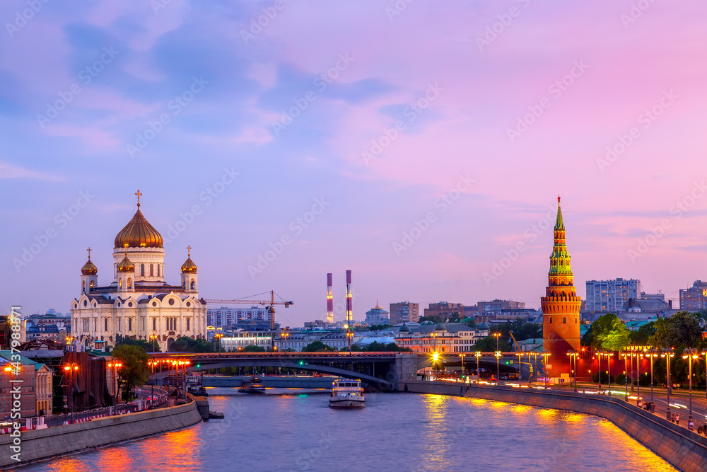 Beautiful sunset over the Moscow River, Cathedral of Christ the Saviour and embankment of the Kremlin. Summer sunset in Moscow, Russia. Beautiful sunset over the Moscow River, Cathedral of Christ the Saviour and embankment of the Kremlin. Summer sunset in Moscow, Russia.