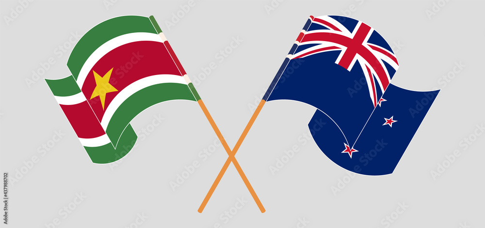Crossed and waving flags of Suriname and New Zealand Crossed and waving flags of Suriname and New Zealand