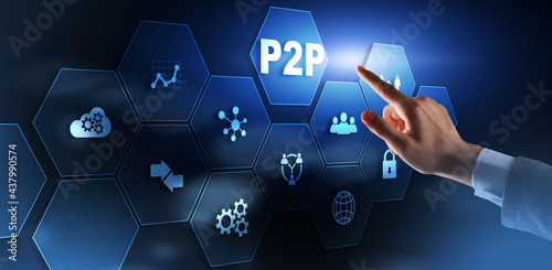 Photos Businessman presses button p2p peer-to-peer on virtual interface