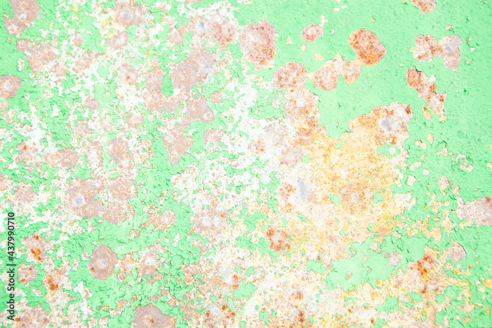 background of old green paint and rust