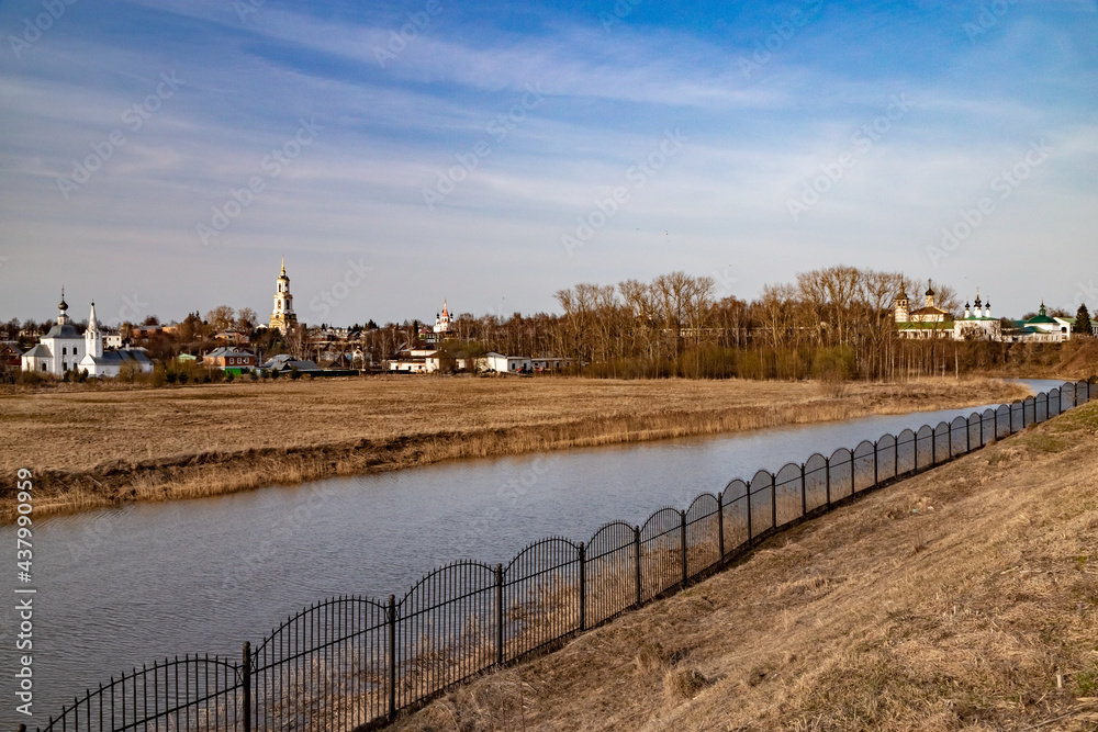 The bank of the Kamenka River in Suzdal view from the territory of the Kremlin. A soulful Russian landscape.