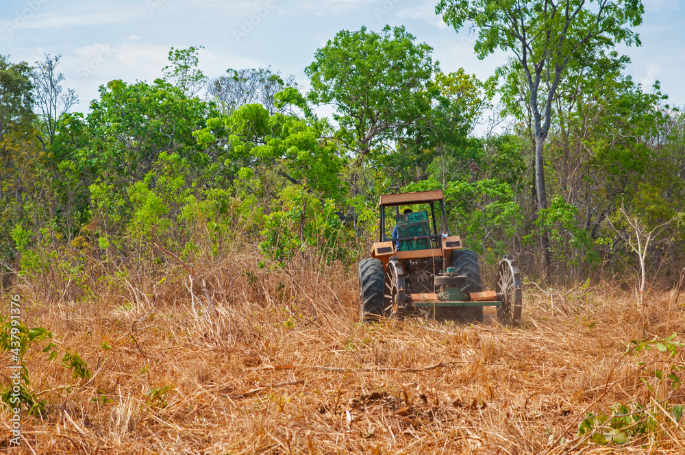 agricultural tractor setting up pasture land agricultural tractor setting up pasture land