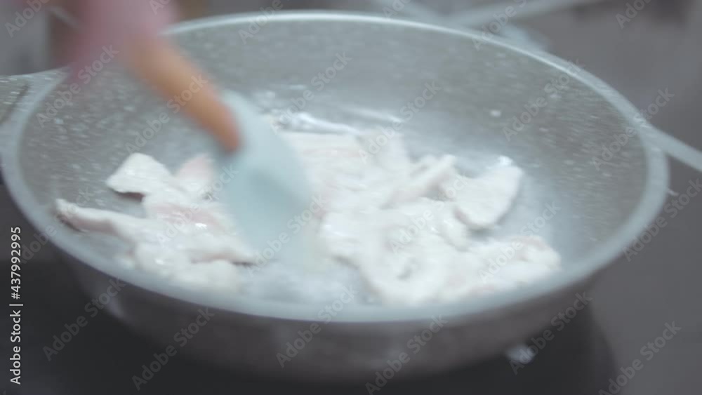 Cooking food in frying pan over the gas stove
Cooking food in frying pan over the gas stove