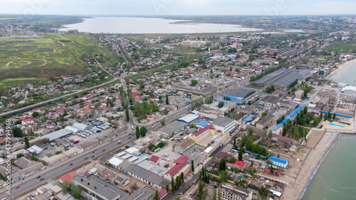 Fototapeta Naklejka Na Ścianę i Meble -  Industrial area on the Black Sea coast. Odessa. Ukraine. Kuyalnitsky estuary in the background.