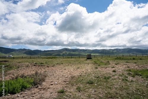 Clouds and mountains by Qinghai lake in summer